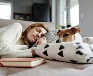 Sleep Can Help You Keep Your Job. Asleep on the sofa.